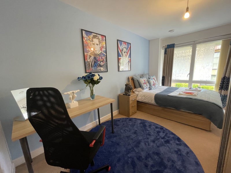 Modern Master Bedroom with Smart TV in New Development